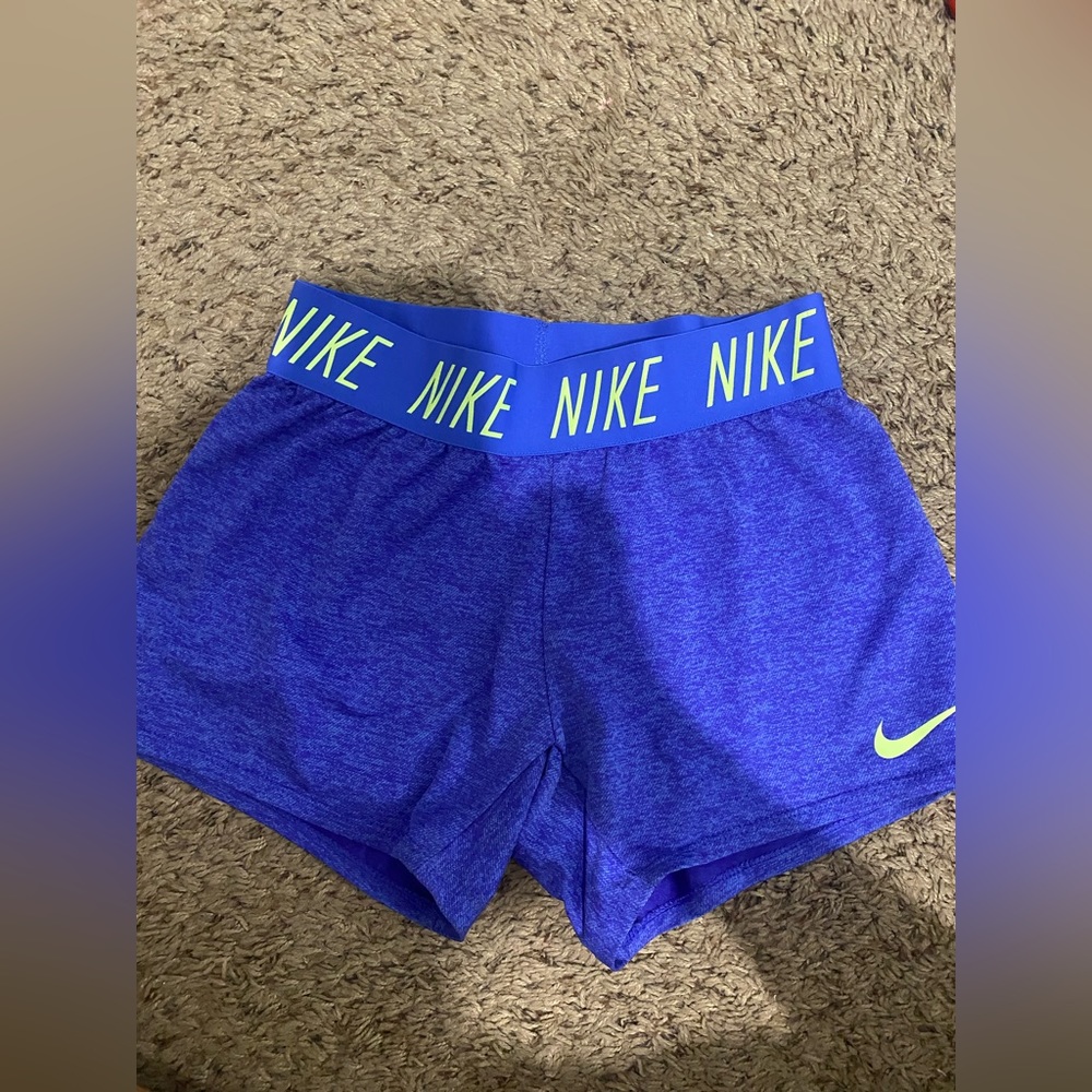 Nike shorts with elastic waist band. Bright neon Yellow/Green accents.